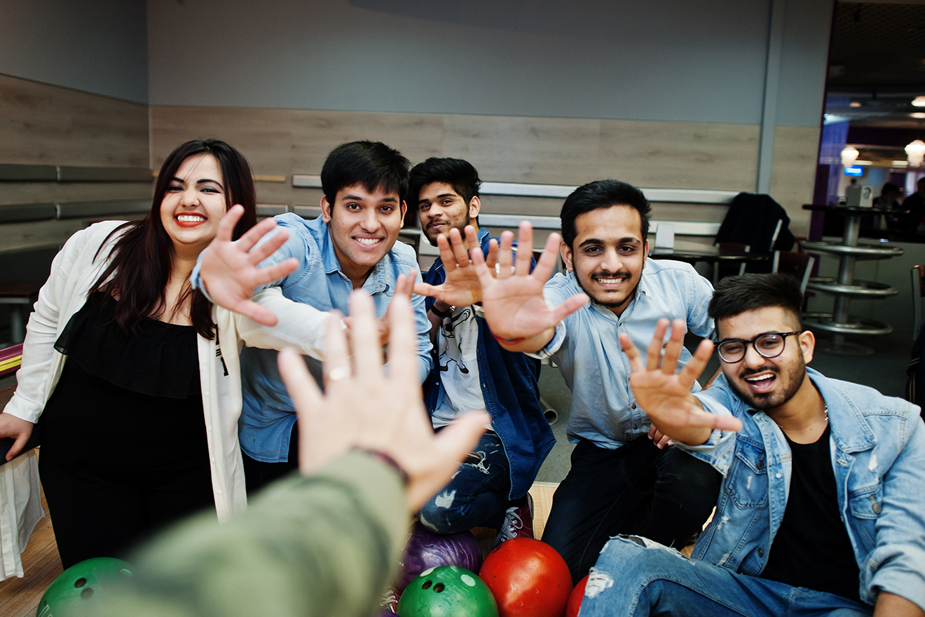 group of young people at a bowling alley