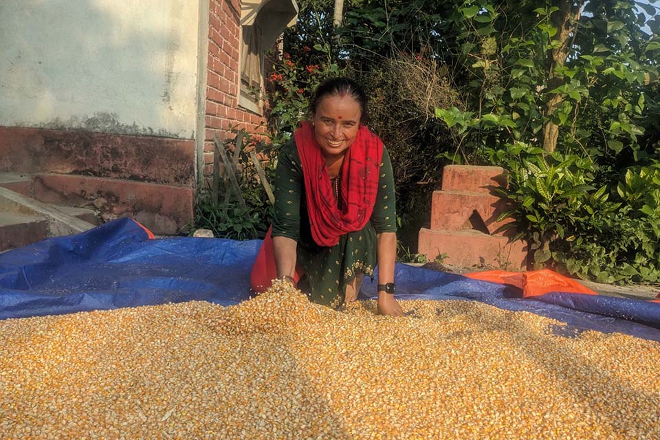 woman with corn kernels